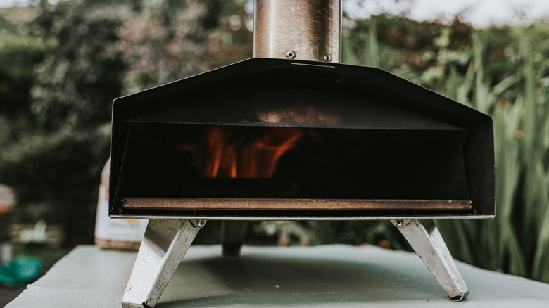 Small pizza ovens sitting outside