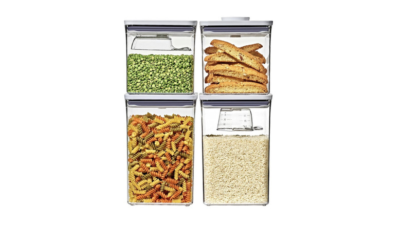 The set of four OXO SoftWorks POP containers with pasta, rice, peas, and biscotti inside them