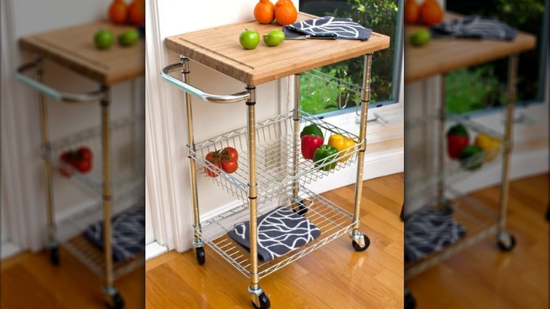 The Trinity EcoStorage kitchen top sits in a kitchen next to a window with fruits and vegetables on it