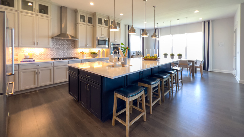 A large modern kitchen with an island.