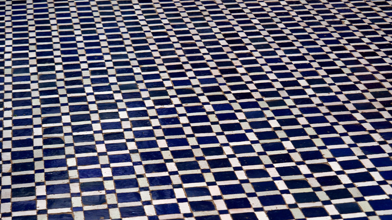 Blue and white zellige tile floor.