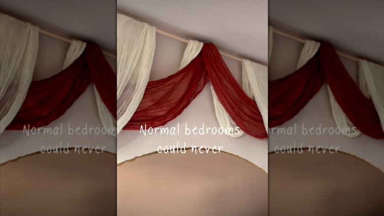 Screenshot of above-the-bed decor, tablecloths woven together above the bed.