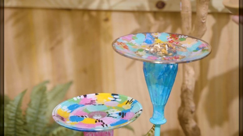 decorative plates being used as bird feeders