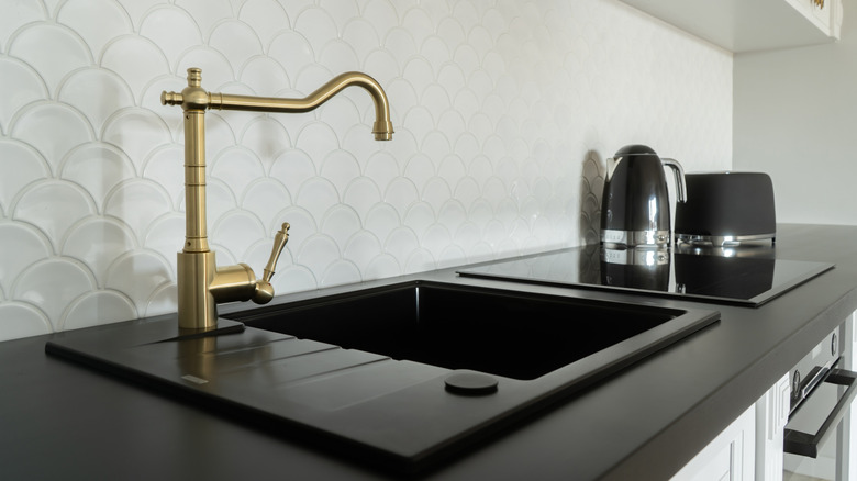 Gold faucet in a kitchen
