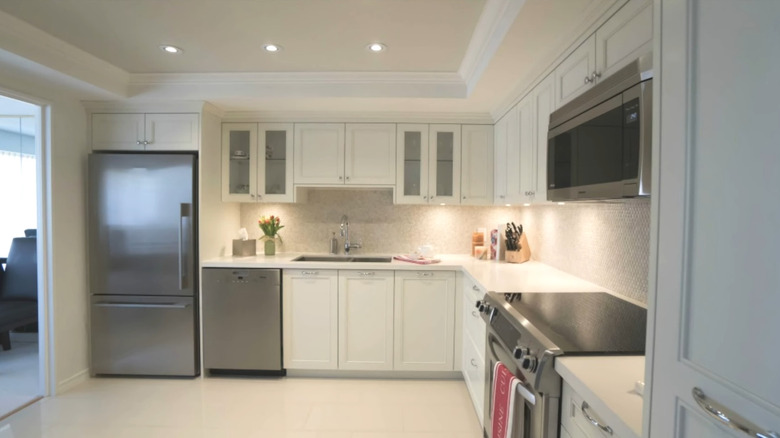 a kitchen soffit blends in as an architectural feature when its extended around the room