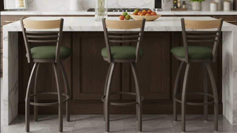 Chairs with hunter green upholstery at breakfast bar