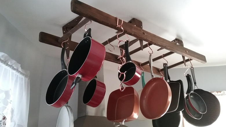 Pot and pan rack hanging from ceiling