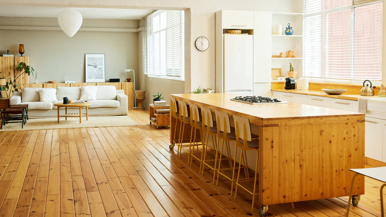 A kitchen with hardwood floors