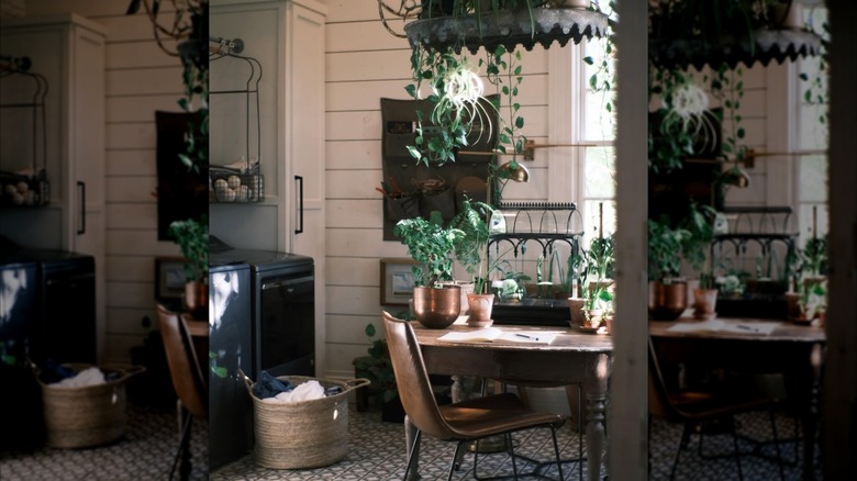 Joanna Gaines's laundry room featuring a table with chairs