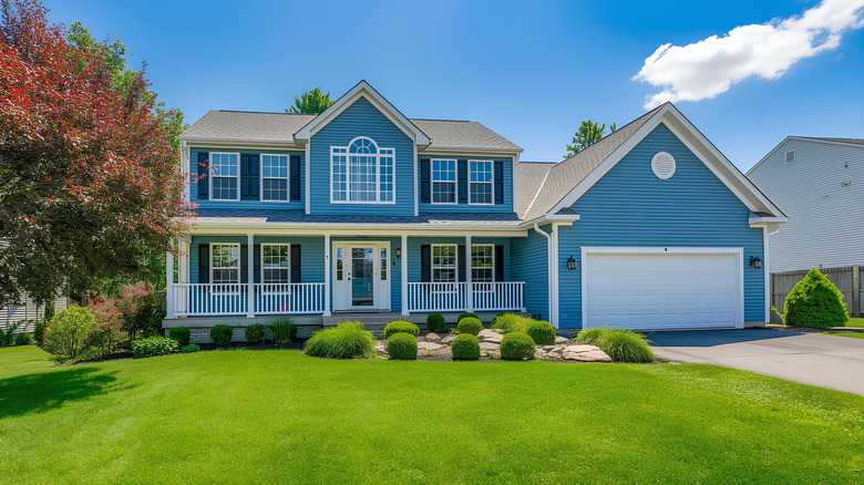 The front of a property with a well-maintained lawn