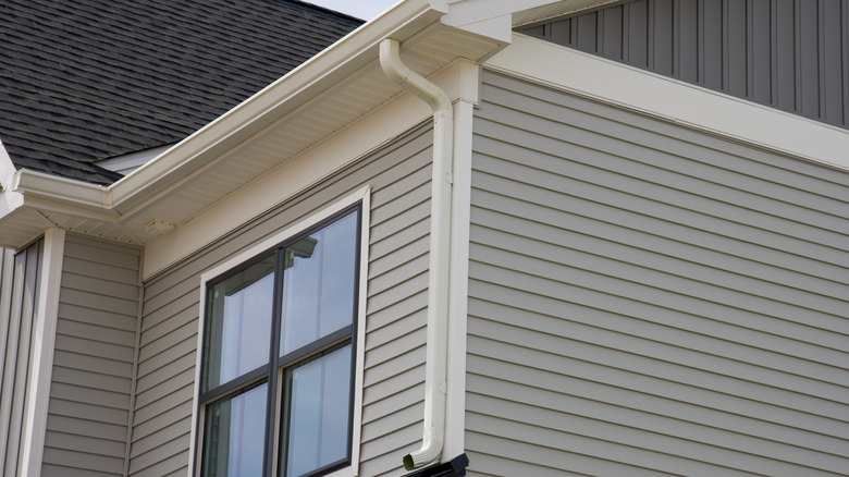 A house with a plain and unattractive downspout