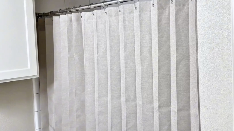 The Magnetic Folding Shower Curtain from AJAZZ