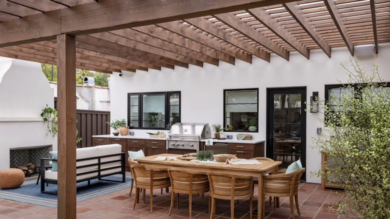 An outdoor living area with a pergola