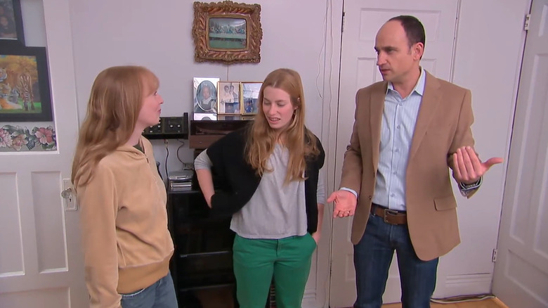 David showing bedroom to two clients