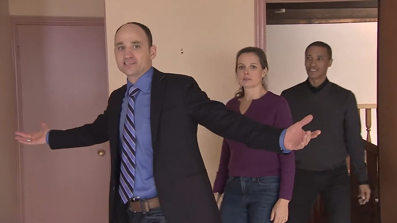 David showing off house to clients