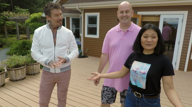 Couple reacting to home