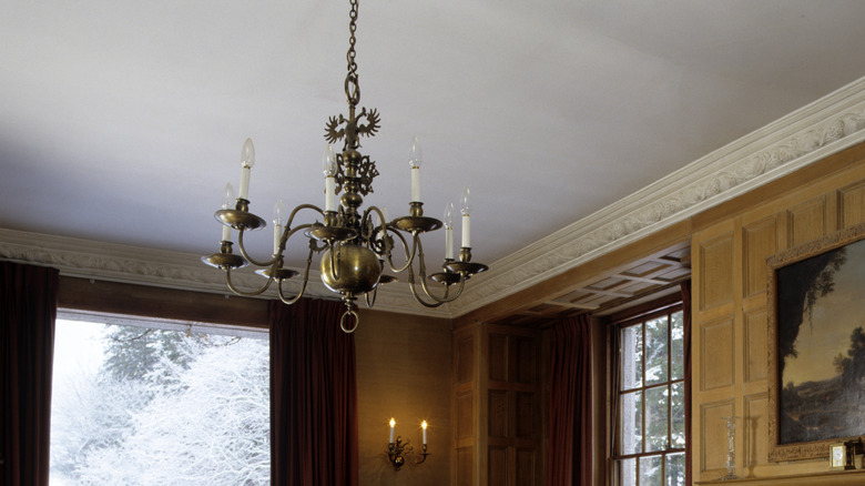outdated light fixture in dining room
