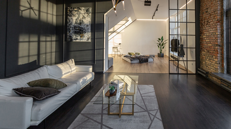 dim, industrial living room with little natural light