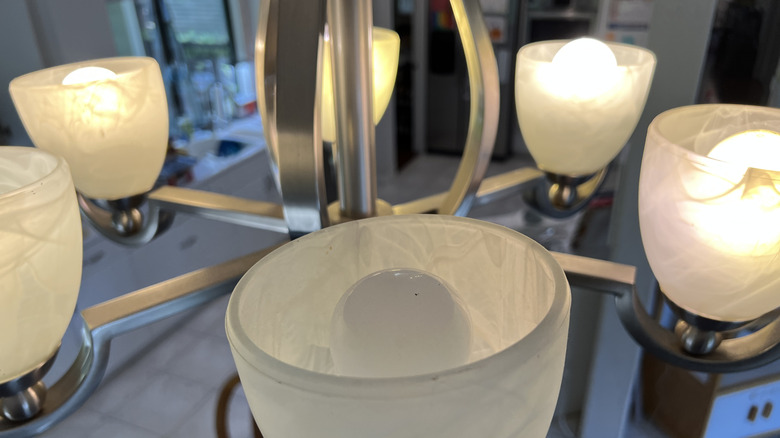 close up of burnt out light in light fixture
