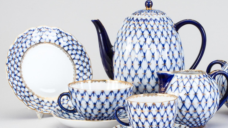 A Lomonosov Imperial Porcelain coffee and tea set in "Cobalt net"