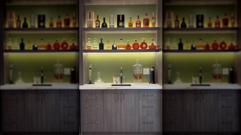Mike Holmes shows off his home bar.