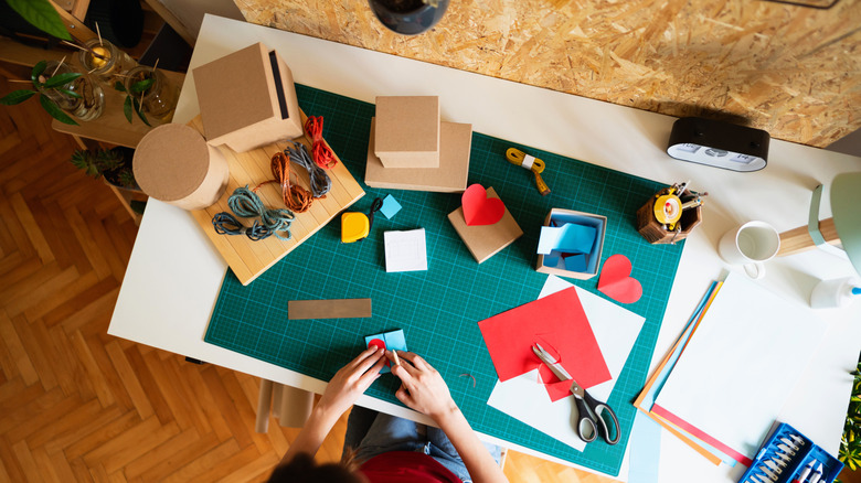 Woman working on a craft table