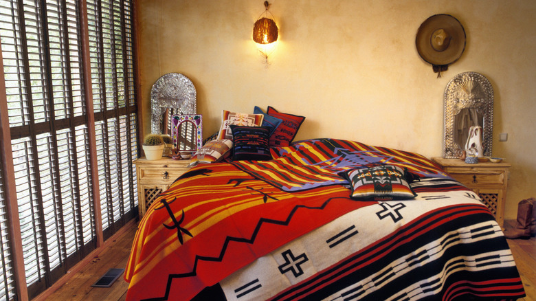 A Southwestern style bedroom with Native American blankets