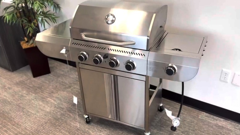 COWSAR propane gas grill on display in showroom