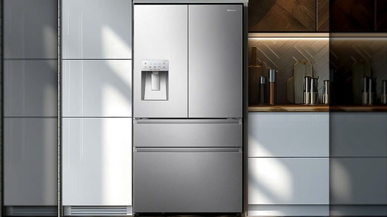 Hisense french door refrigerator with ice dispenser in kitchen