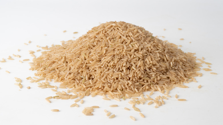 brown rice on white background