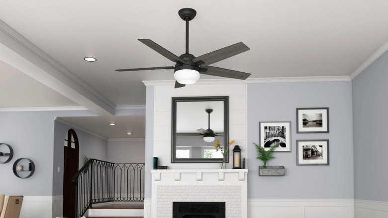 A ceiling fan hanging in a modernist house