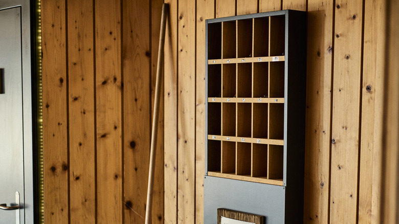 chic wall-mounted wooden mail sorter