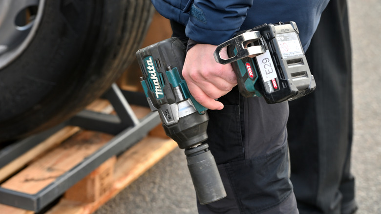 Man using Makita power tool