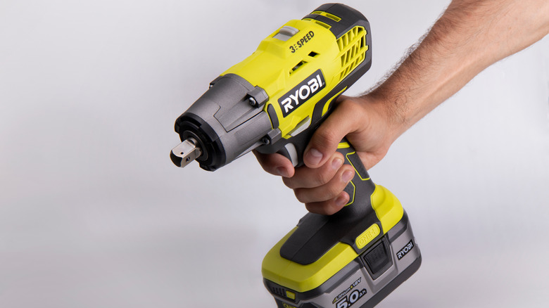 Man using Ryobi power tool
