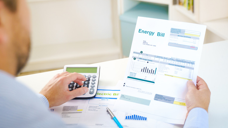 Man reviewing an energy bill