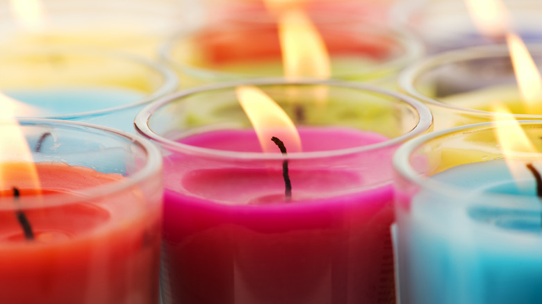 Close up of lit colorful candles