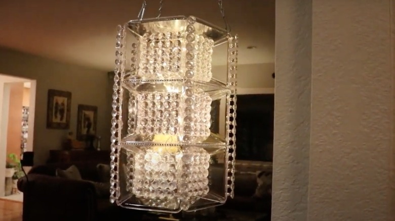 DIY gemstone chandelier hanging in a living room