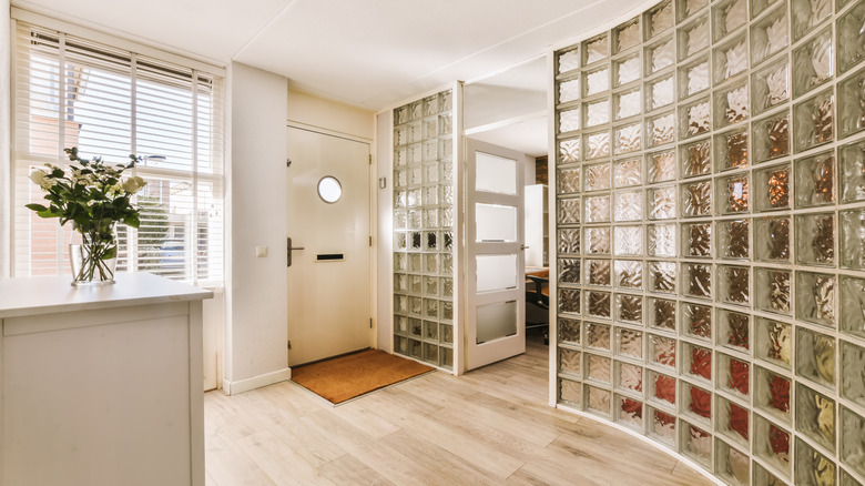 Home with floor to ceiling glass block walls