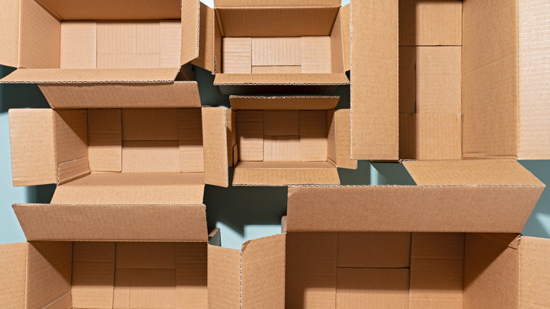 Top-down view of opened, empty cardboard boxes of various sizes