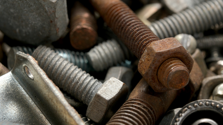 A pile of rusty bolts