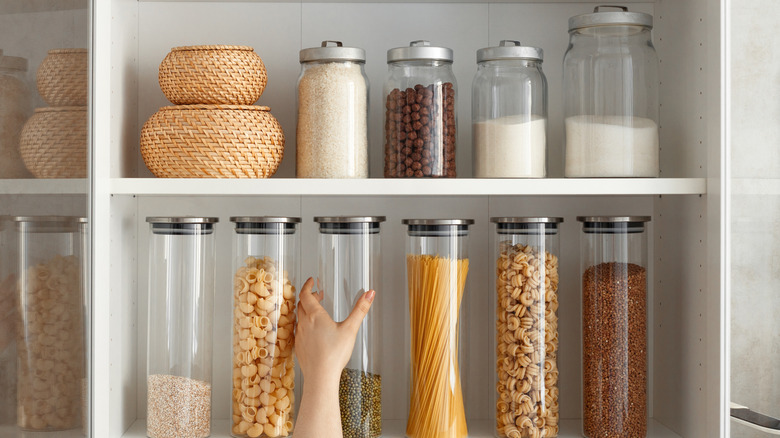 An organized shelf with reusable containers.