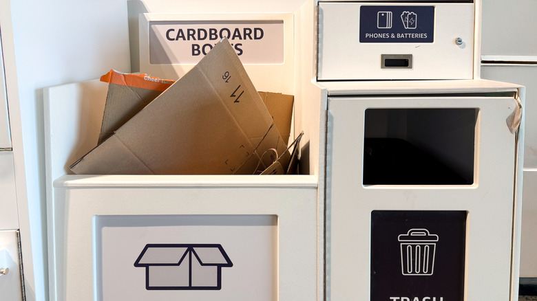 Recycling bins, including one for phones and batteries