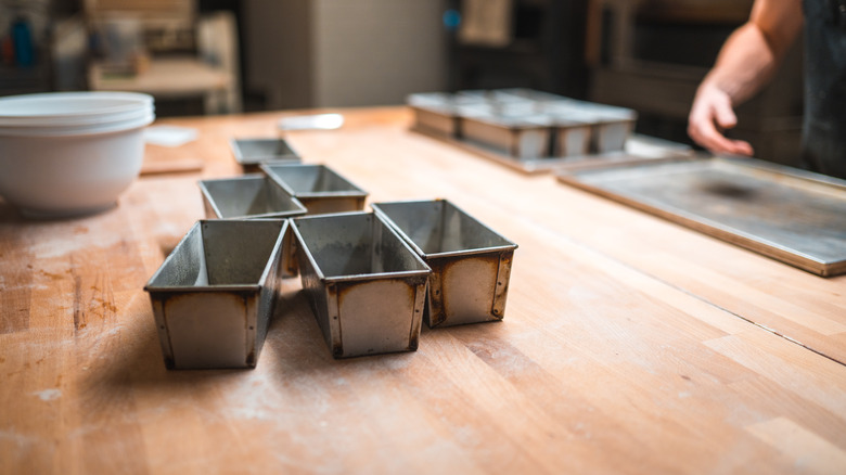 old loaf pans on counter