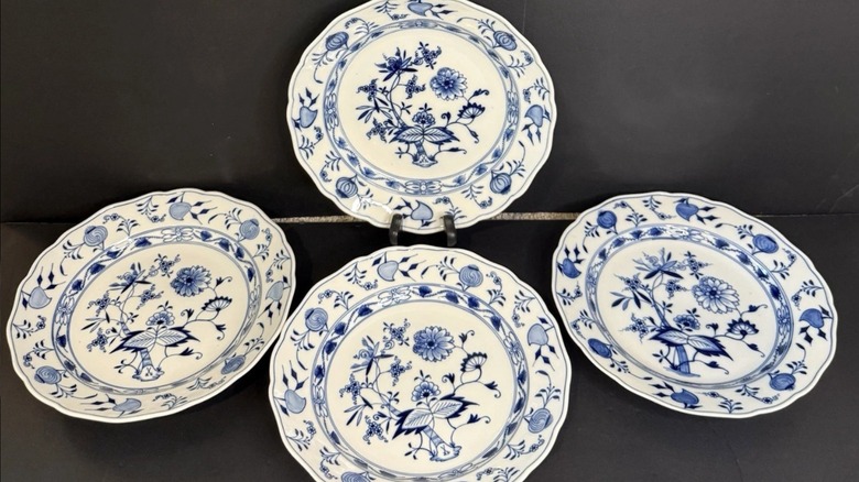 A set of four Meissen Blue Onion dinner plates