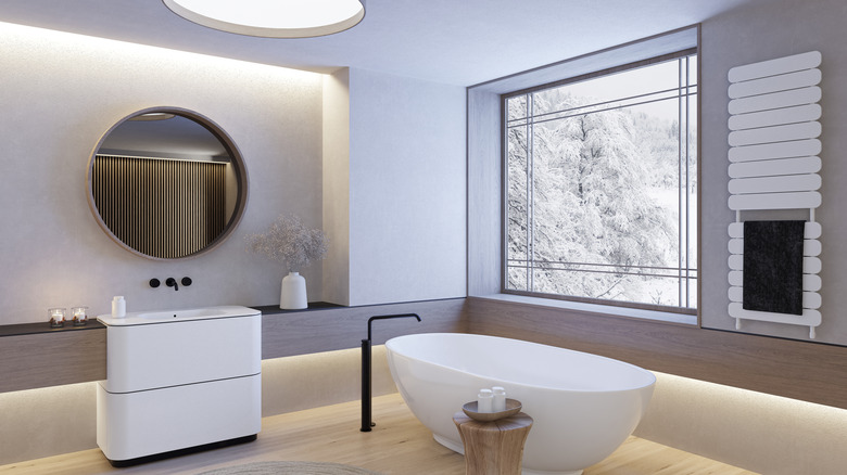 Bathroom in wintertime with a snowy scene outside