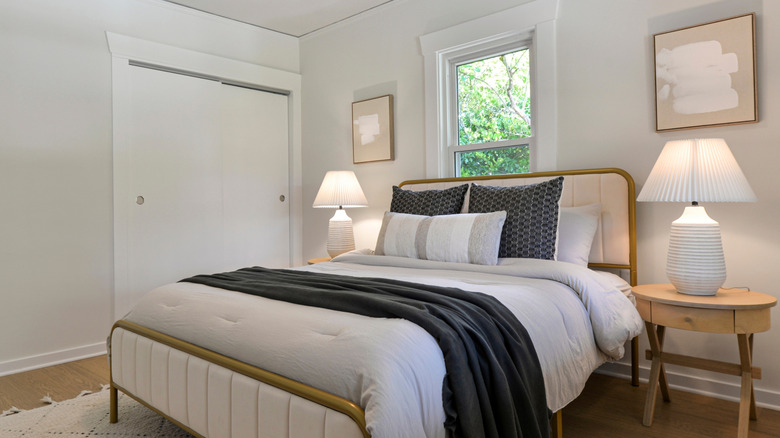 Nice bedroom with boring white closet doors