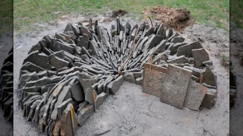 Pieces of PA Blue Stone stacked vertically to build a fire pit