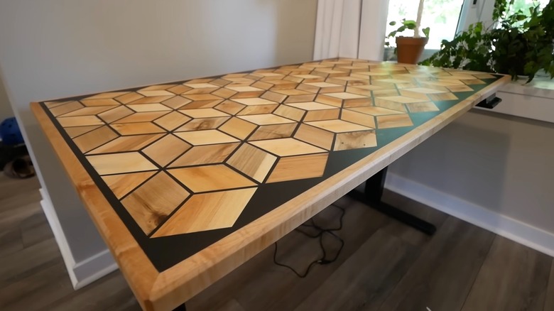 Custom made desk by Morley Kert using old wood pallets.