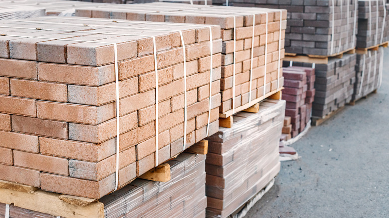 Bricks on pallets stacked up at a supply yard