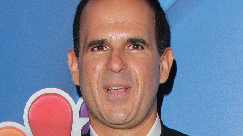 Marcus Lemonis posing at industry event